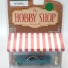 1972 Cadillac Coupe DeVille With Vintage Gas Pump In 1:64 Scale *RARE GREEN WHEELS By Greenlight